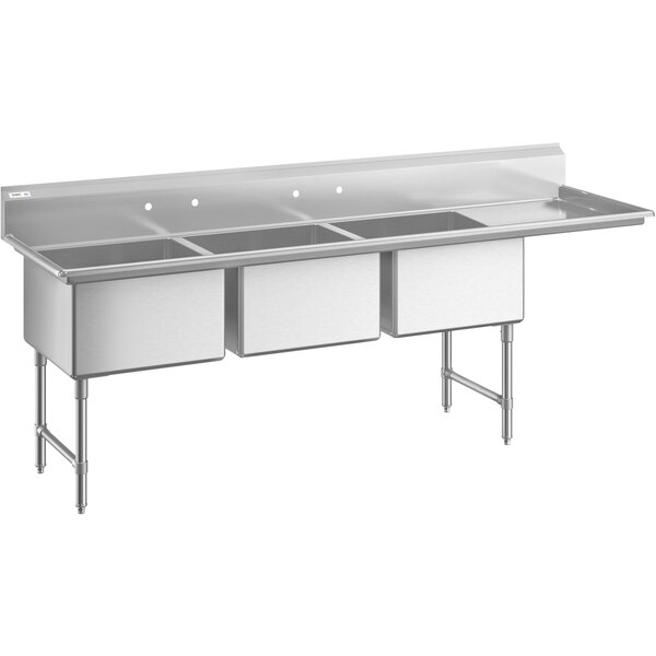 A Regency stainless steel three compartment commercial sink with right drainboard.