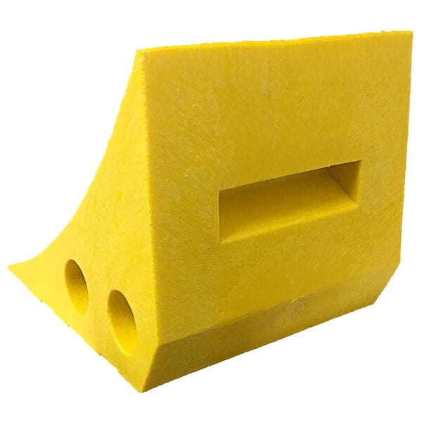 A yellow plastic block with two holes.