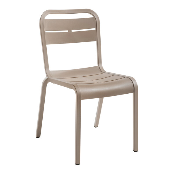 A tan plastic Grosfillex Cannes outdoor sidechair.