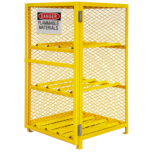 A yellow metal mesh storage unit with a self-closing door and warning sign on it.