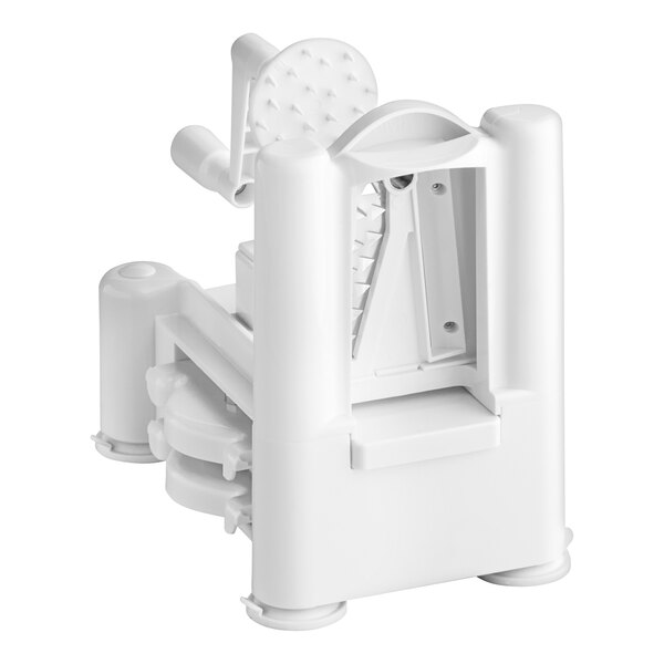 A white machine with a handle for cutting fruits and vegetables.