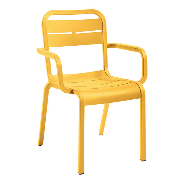 A yellow Grosfillex outdoor armchair with armrests.