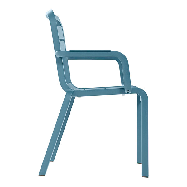 A Grosfillex Cannes blue resin outdoor armchair with armrests.