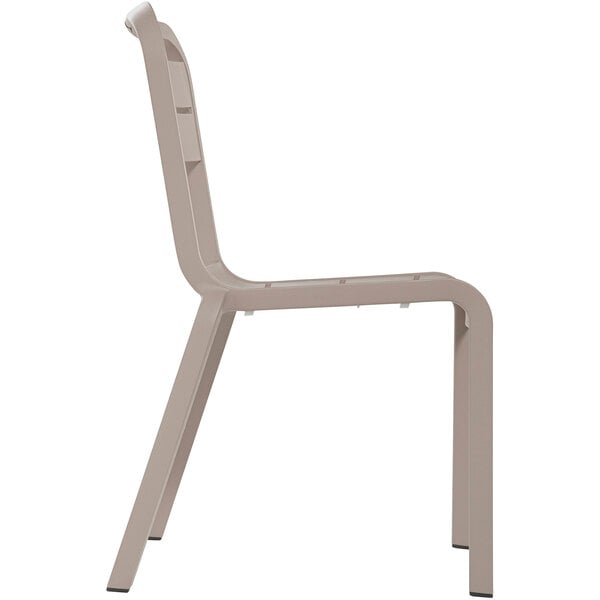 A Grosfillex white resin outdoor restaurant sidechair.