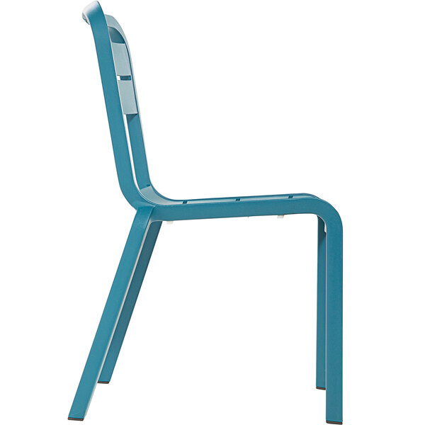 A stack of blue Grosfillex Cannes resin outdoor sidechairs.