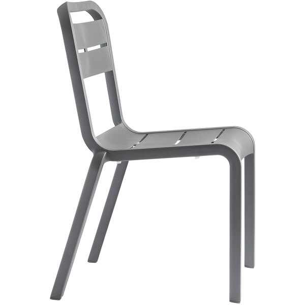 A gray plastic Grosfillex outdoor sidechair with slats.