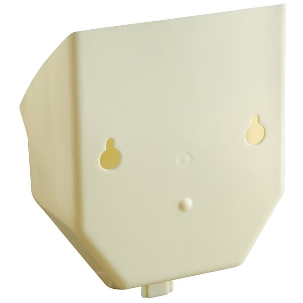 A white wall mounted rack with a circle in the middle and holes for white plastic objects.