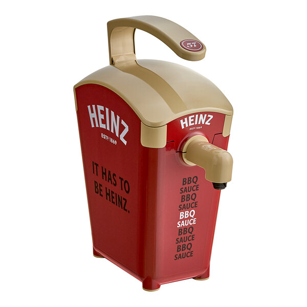 A Heinz brown plastic countertop barbeque pump dispenser with a tan handle.