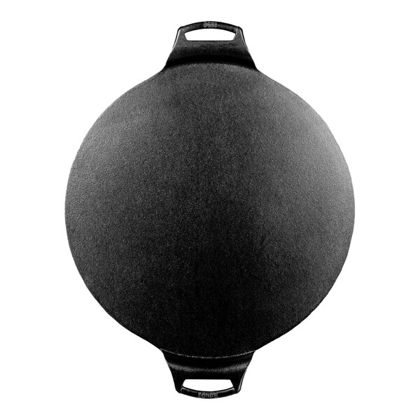 A Lodge black cast iron pizza pan with two handles.