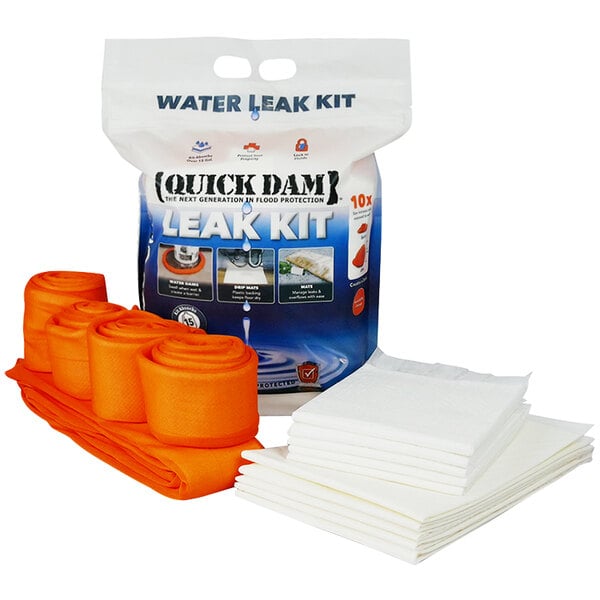 A bag of orange rolled Quick Dam flood barriers with white packaging.