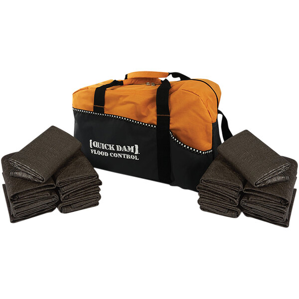 A large Quick Dam duffel bag with a black handle.