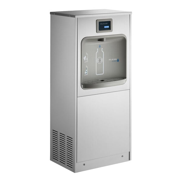 A stainless steel freestanding hands-free filtered bottle filling station with a chilled water feature.