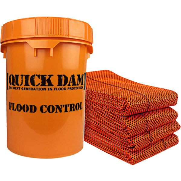 A close-up of an orange Quick Dam bucket with black text.