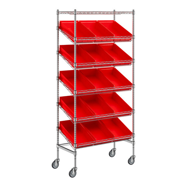 A Regency metal shelving unit with red slanted shelves and bins on wheels.