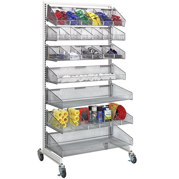 A chrome metal Quantum wall hanging rack with baskets on it.