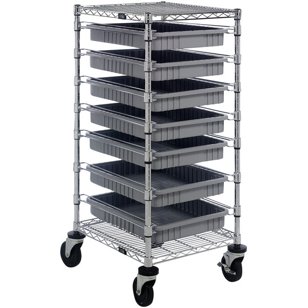 A Quantum metal cart with 7 grey divider bins on it.
