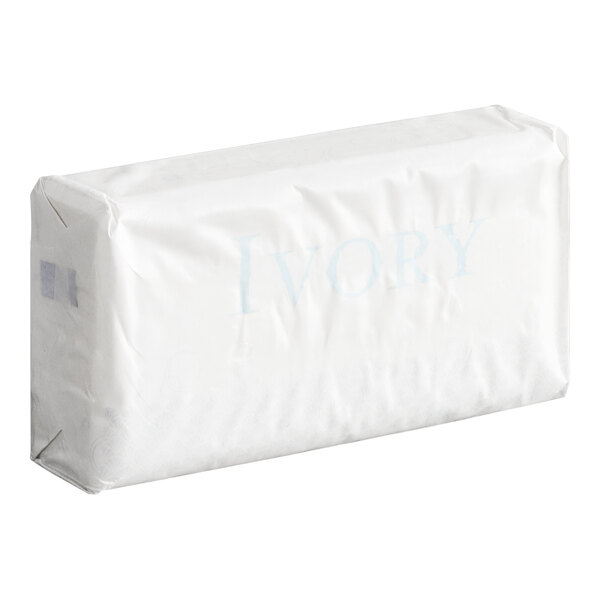 A white rectangular object with blue text that reads "Ivory 4 oz. Original Scent Gentle Bar Soap"