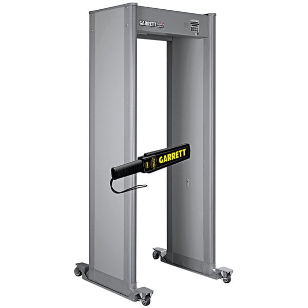 A Garrett PD6500i walk-through metal detector with a black handle.
