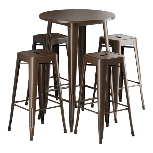 A Lancaster Table & Seating Alloy Series round copper bar height table with a group of backless barstools.