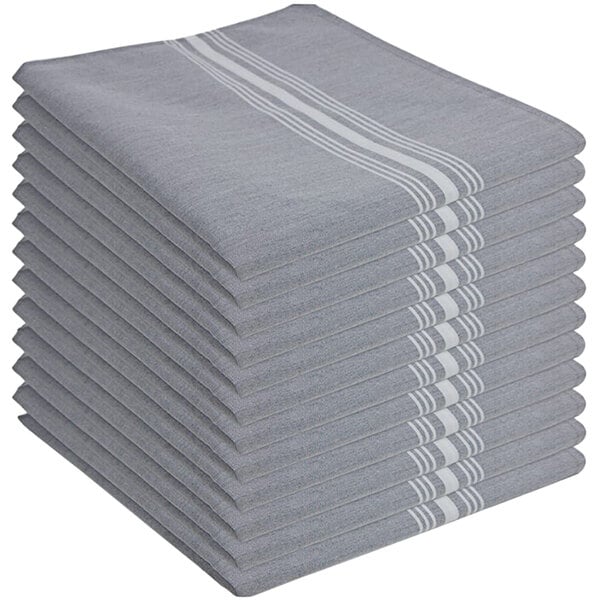 A stack of folded grey Monarch Brands Mariposa bistro striped cloth napkins.