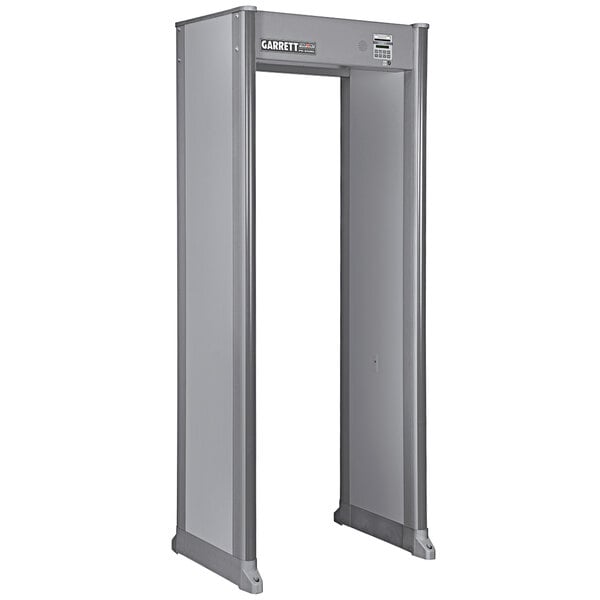 A Garrett PD6500i ADA compliant walk-through metal detector with a white background.