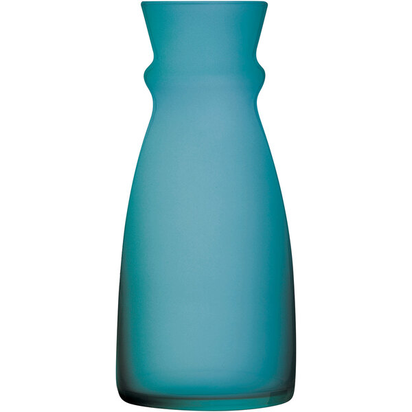 An Arcoroc glass carafe with a blue tint.