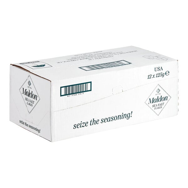 A white box of Maldon Sea Salt Flakes with blue text and a bar code.