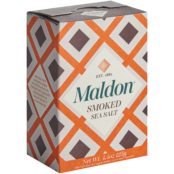 A white box of Maldon Smoked Sea Salt Flakes with a pattern.
