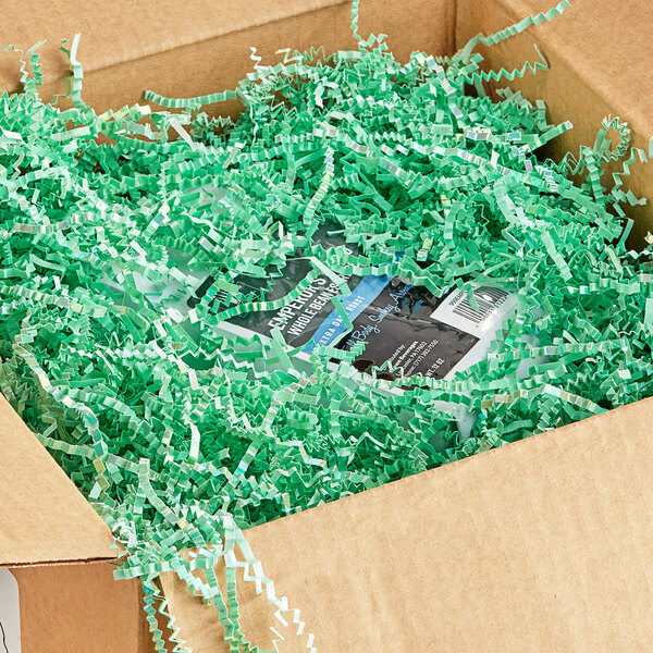 A box with Spring-Fill Mint Green Crinkle Cut Paper Shred inside.