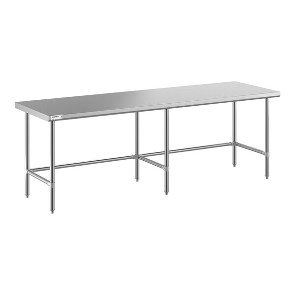 A long, rectangular stainless steel table with an open base and six legs, designed for commercial use.