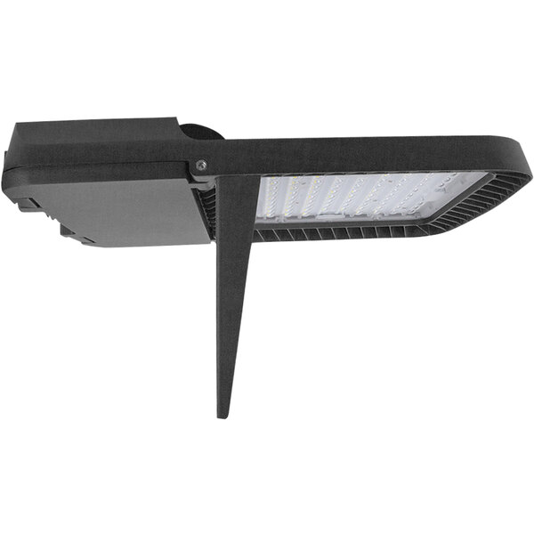 A close-up of a TCP Elements LED area light with a black backlight shield.