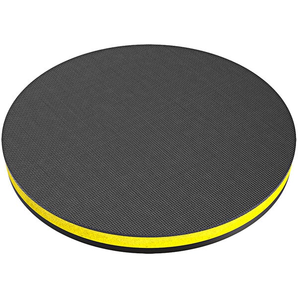 A black and yellow circular Onfloor hook and loop pad driver.