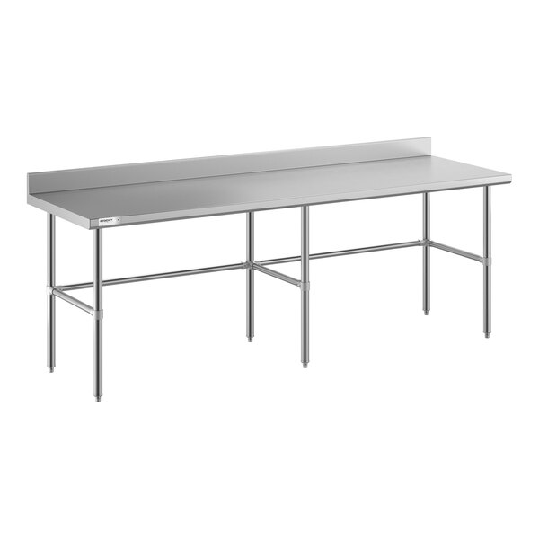 A large stainless steel work table with an open base, six legs, and a 4-inch backsplash along the back edge.
