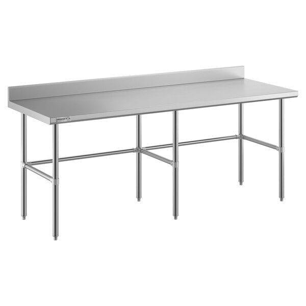 A Regency stainless steel work table with a long rectangular top.