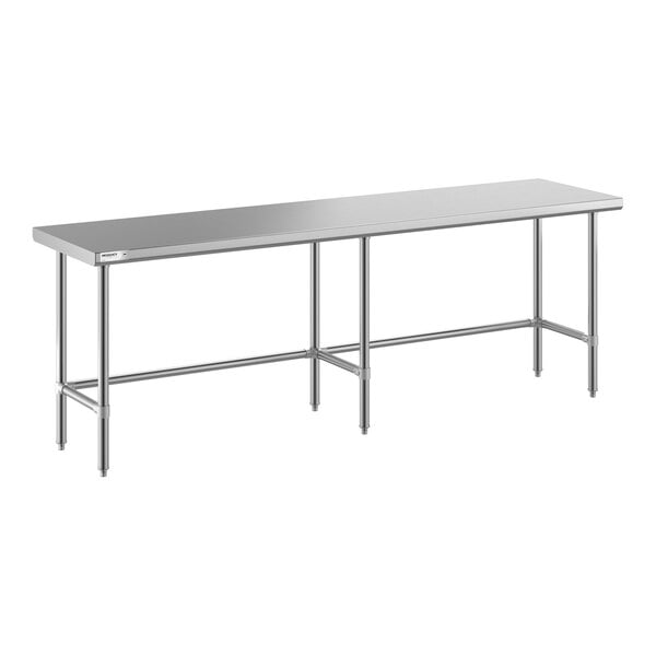 A long, rectangular stainless steel table with an open base and six legs, designed for commercial use.