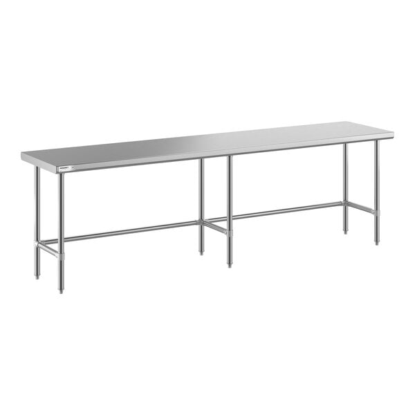 A long, rectangular stainless steel table with an open base and metal legs.