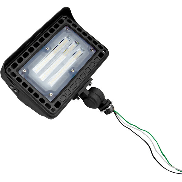 A close-up of a black TCP Elements yoke mount flood light with wires attached.