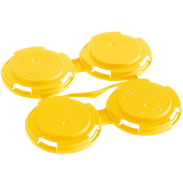 A yellow plastic PakTech can carrier with four round holders.