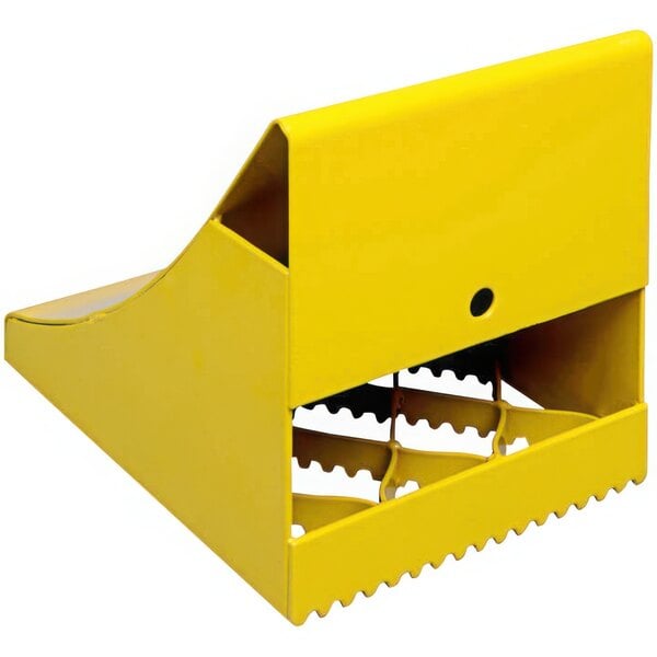 A yellow steel Ideal Warehouse ice chock with a hole in the middle.