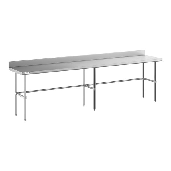 A long stainless steel work table with an open base, six legs, and a 4-inch backsplash along the back edge.