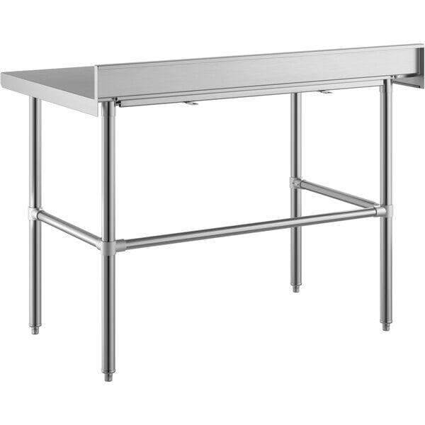 A Regency stainless steel work table with open legs.