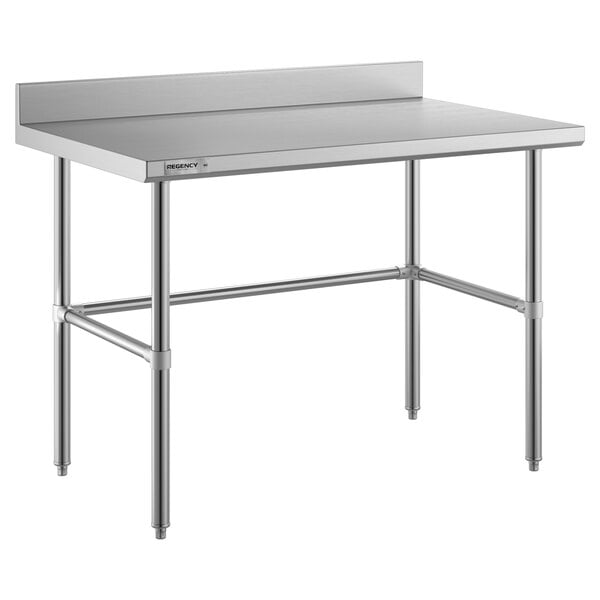 A Regency stainless steel work table with an open base.