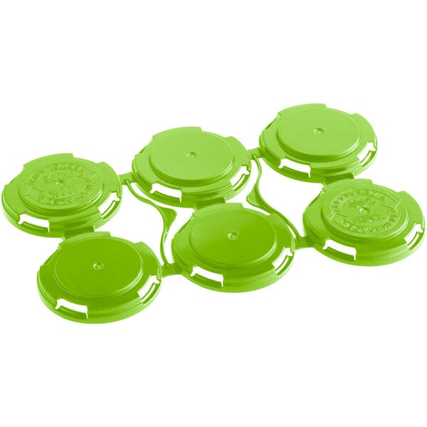 A Spring Green plastic PakTech can carrier with six circles for cans.