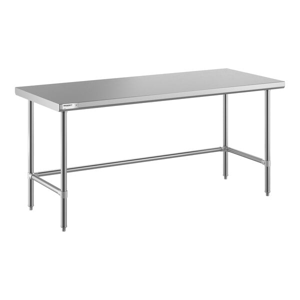 A rectangular metal table with a flat top and open base supported by four legs and horizontal bars.