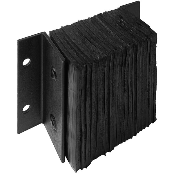 A black metal Ideal Warehouse dock bumper with a stack of black metal dock bumpers.