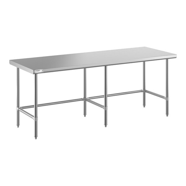 A large stainless steel work table with an open base and six legs, designed for commercial use.