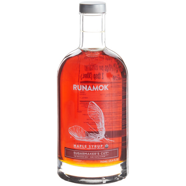 A bottle of Runamok Sugarmaker's Cut maple syrup with a white label.