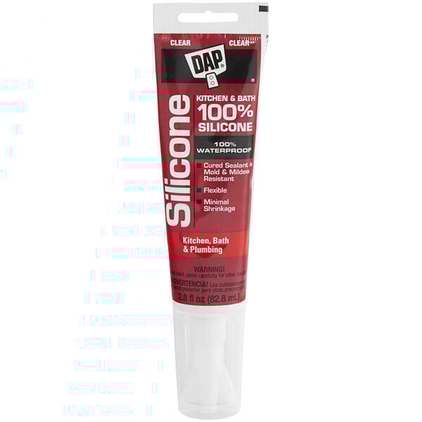 A red tube of DAP Clear Silicone Rubber Sealant with white text.