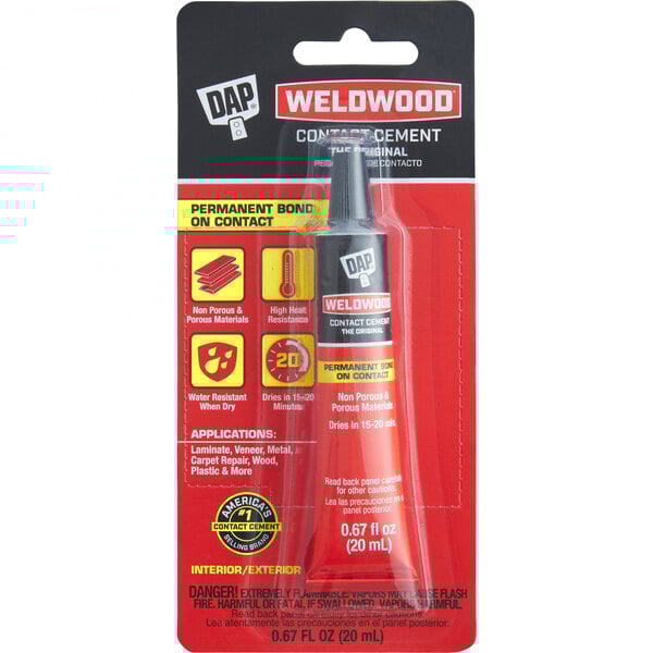 A black tube of DAP Weldwood Tan Original Contact Cement in a package.