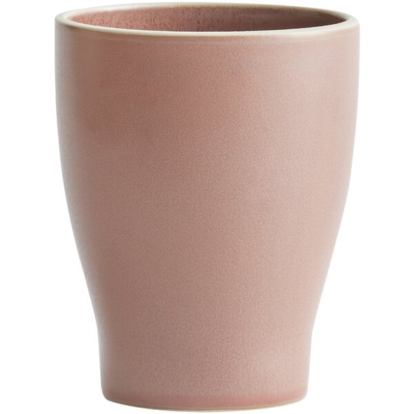 A close up of a pink Luzerne Moira stoneware tumbler.